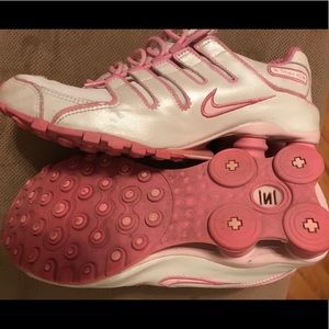 Pink and white Nike shox